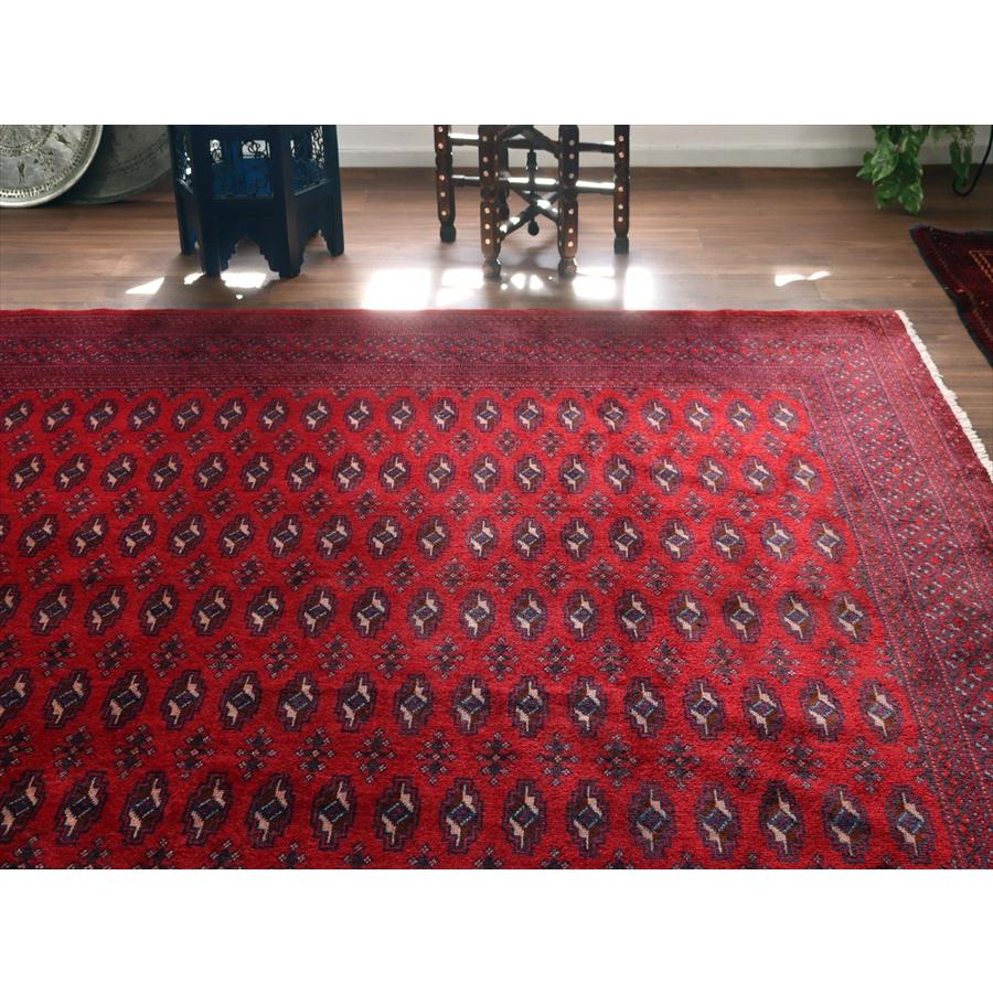 トルクメン族の絨毯 手織りラグ 277x212cm 連続するギュル文様 レッド