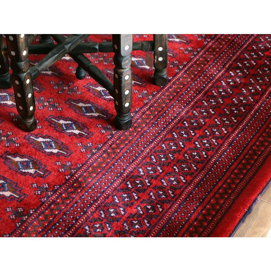 トルクメン族の絨毯 手織りラグ 277x212cm 連続するギュル文様 レッド