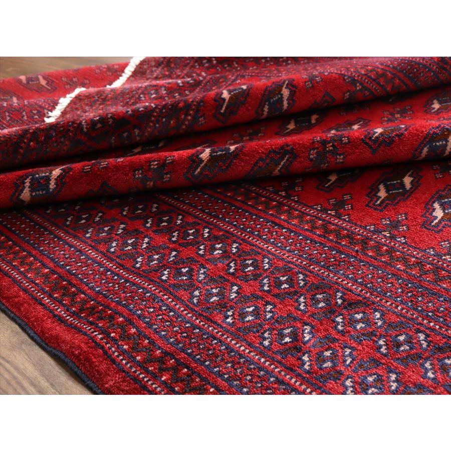 トルクメン族の絨毯 手織りラグ 277x212cm 連続するギュル文様 レッド