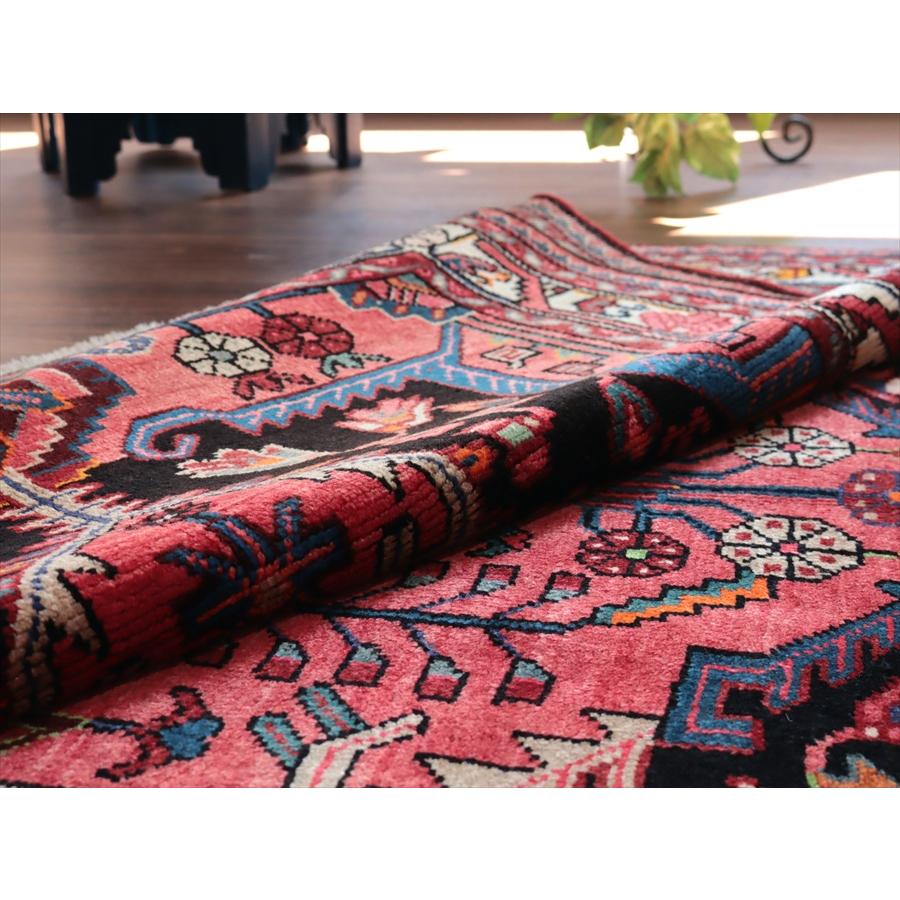 イランの手織りラグ トイセルカン 177x114cm メダリオンと小花 レッド＆ネイビー |  | 10