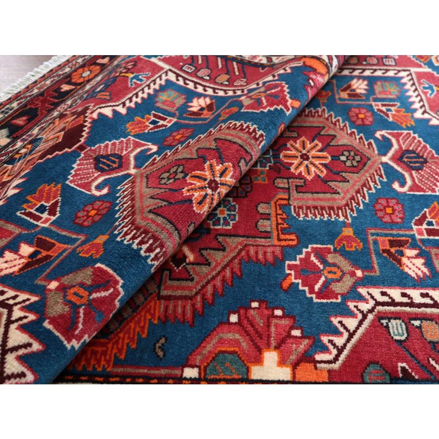 イランの手織りラグ トイセルカン 153x117cm メダリオンと小花 レッド＆ブルー |  | 09