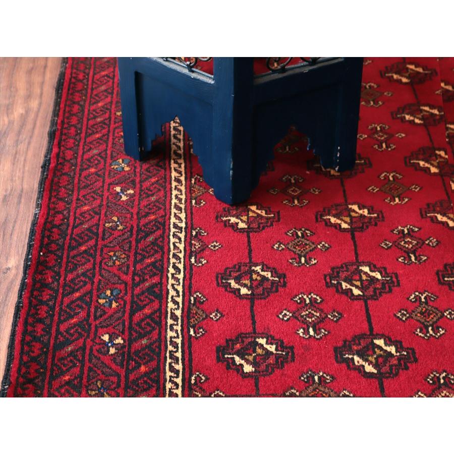 イランの手織りラグ バルーチ 194x114cm 連続する幾何学模様 |  | 06