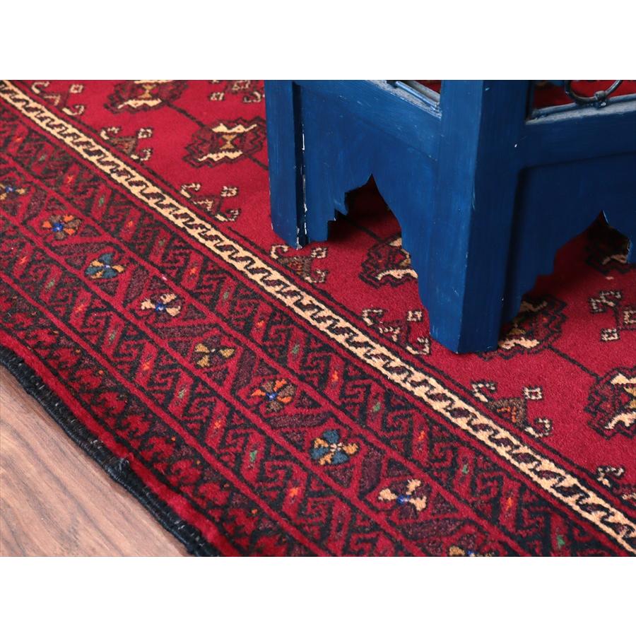 イランの手織りラグ バルーチ 194x114cm 連続する幾何学模様 |  | 07