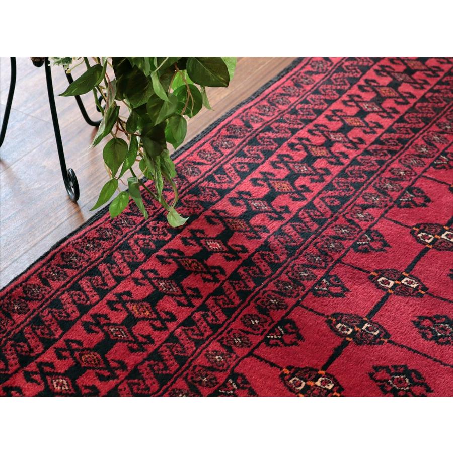 イランの手織りラグ バルーチ 214x115cm 連なる幾何学模様 レッド |  | 06