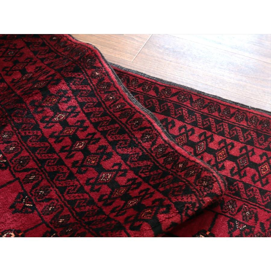 イランの手織りラグ バルーチ 214x115cm 連なる幾何学模様 レッド |  | 08