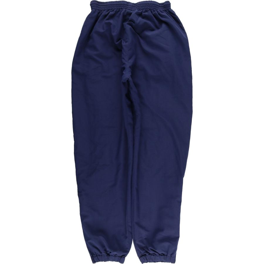 新品☆umbro シャカシャカ パンツ O umbro（アンブロ） 古着 90年代 ウォームアップパンツ ナイロンパンツ