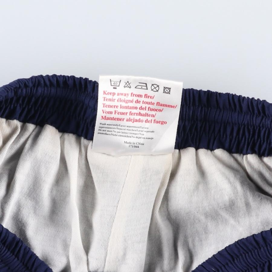 umbro（アンブロ） 古着 90年代 ウォームアップパンツ ナイロンパンツ