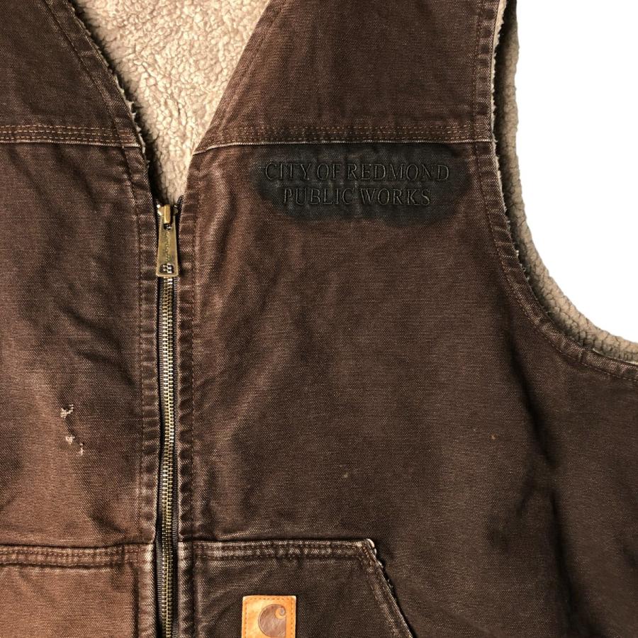 【古着】Carhartt ダックベスト ペンキ カーハート size:2XL【 carhartt 】カーハート ダックベスト キャメル色 古着 古着