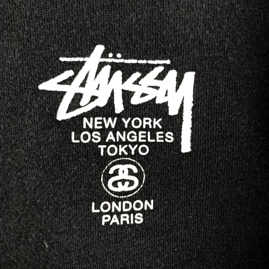 STUSSY（ステューシー） 古着 国旗柄 スウェットプルオーバーパーカー