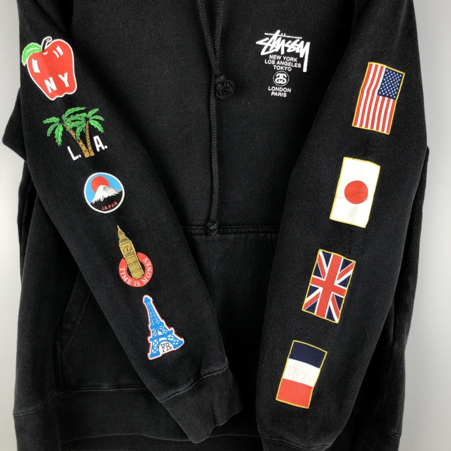 STUSSY（ステューシー） 古着 国旗柄 スウェットプルオーバーパーカー