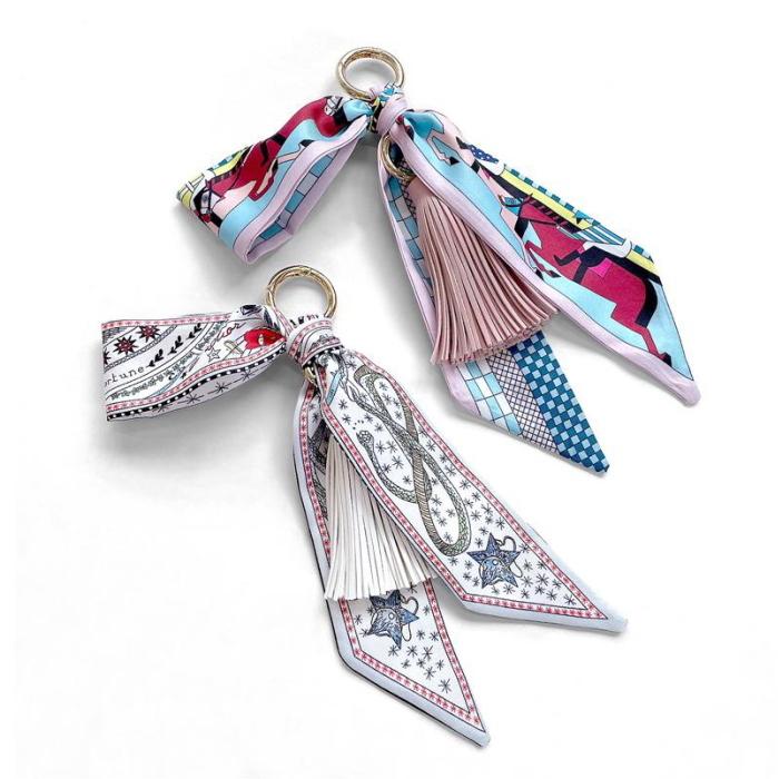 SOLD◇ ハンドメイド タッセル バッグチャーム キーホルダー アリス 蝶