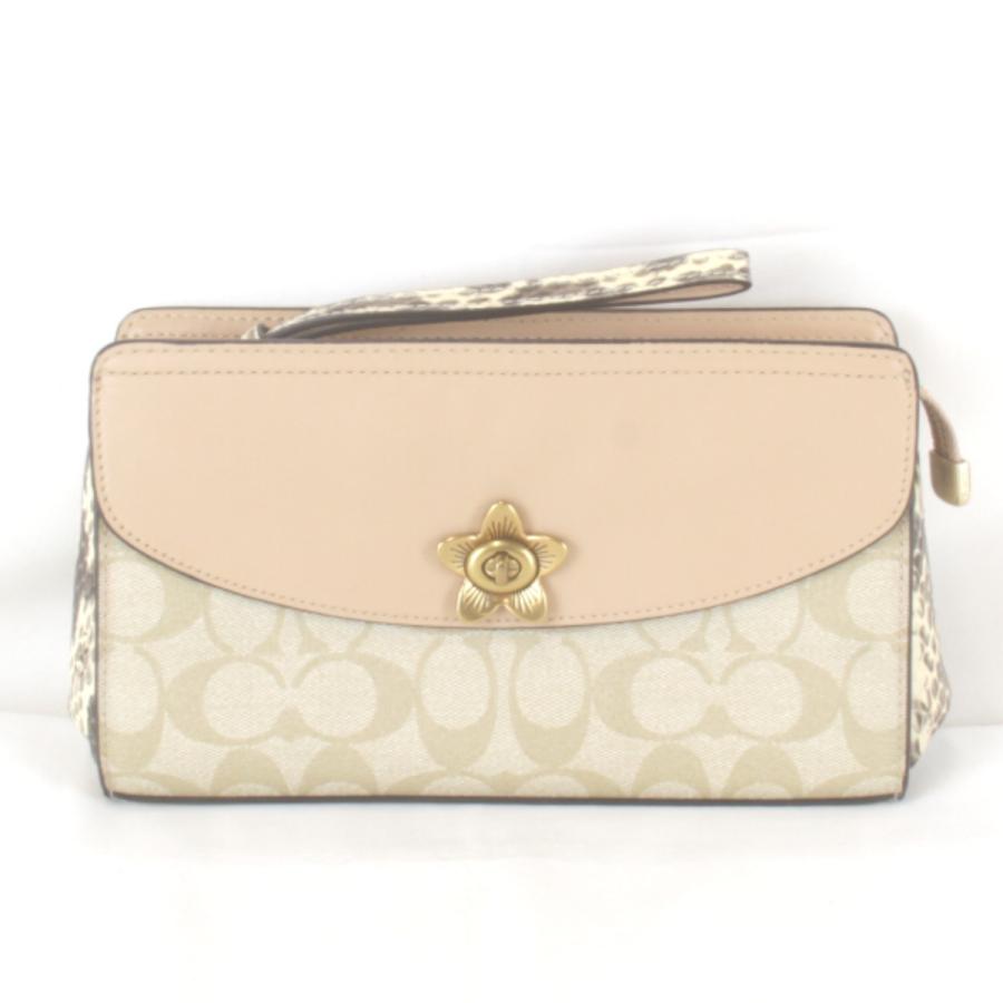 COACH（コーチ） 良品『USED』 シグネチャー フラワーターンロック