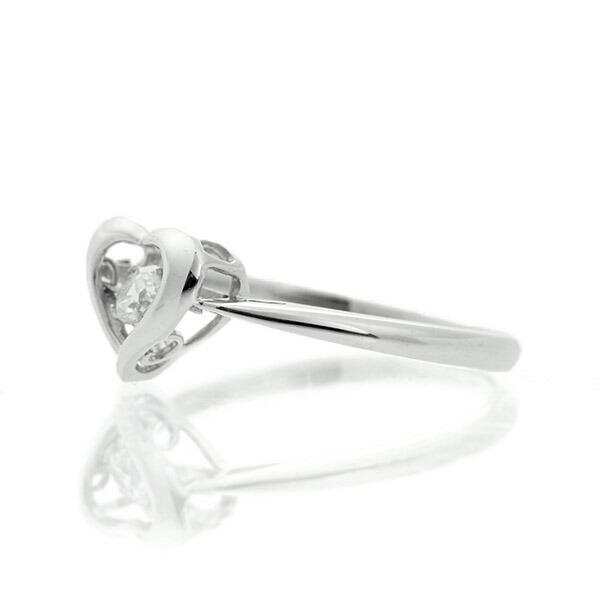 ダンシングストーン ダイヤモンド リング 0.1ct プラチナ Pt900 揺れる リング ダンシングダイヤ ハート クロスフォー 正規品 鑑別書付 保証書付の画像