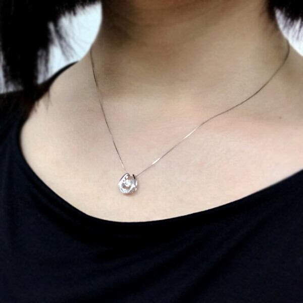 ダンシングストーン ダイヤモンド ネックレス 0.2ct プラチナ Pt900 揺れる ネックレス ダンシングダイヤ 馬蹄 ホースシュー クロスフォー 正規品 鑑別書付の画像