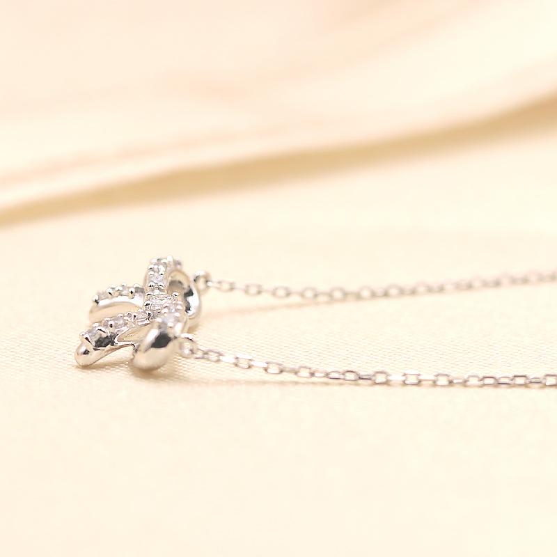 K10YG/WG/PG ダイヤモンド 0.08ct 【Hカラークラス/SIクラス】ペンダント ネックレス 10金 ゴールド リボン プチ 選べる3カラーの画像