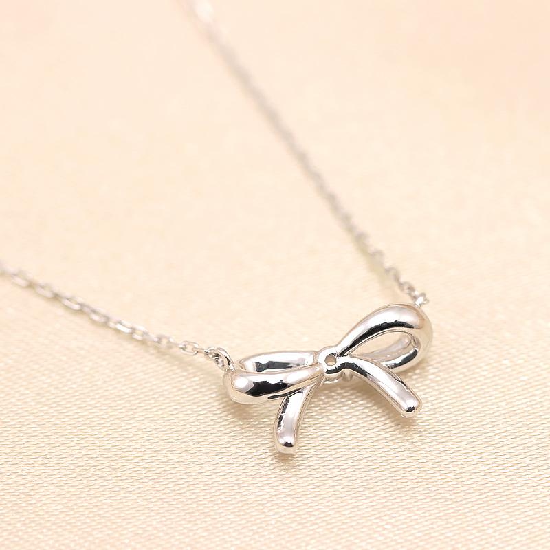K10YG/WG/PG ダイヤモンド 0.08ct 【Hカラークラス/SIクラス】ペンダント ネックレス 10金 ゴールド リボン プチ 選べる3カラーの画像
