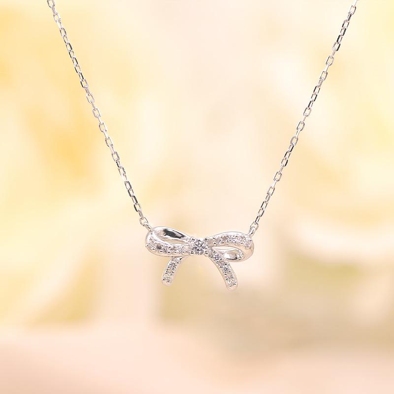 K10YG/WG/PG ダイヤモンド 0.08ct 【Hカラークラス/SIクラス】ペンダント ネックレス 10金 ゴールド リボン プチ 選べる3カラーの画像