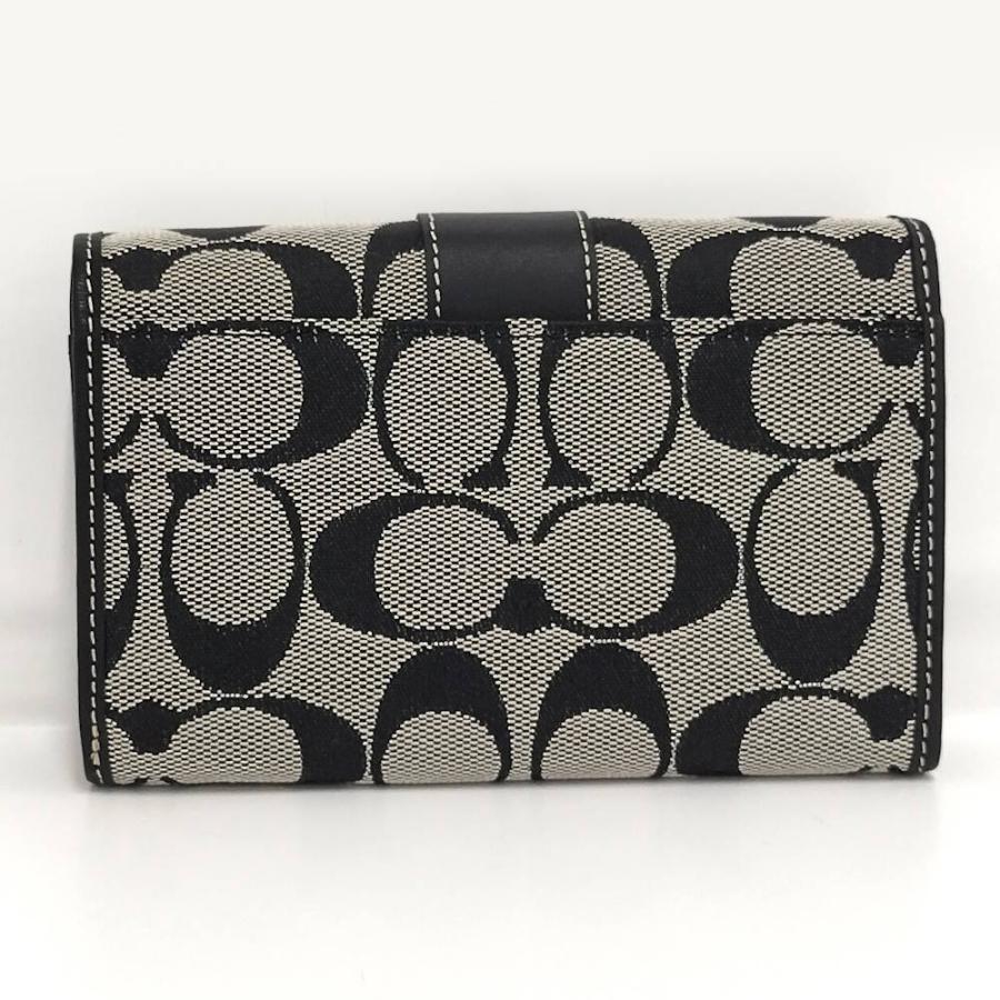 COACH（コーチ） 財布 二つ折り シグネチャー キャンバス ネイビー