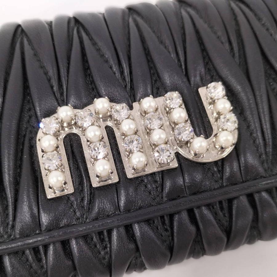 miu miu（ミュウミュウ） 二つ折り長財布 マテラッセ ロゴ ライン