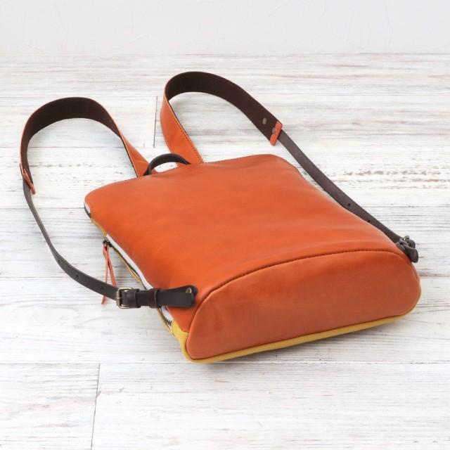 altoのオレンジレザーとイエローバックキャンバスリュック