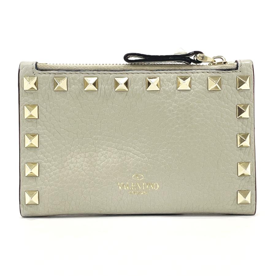 ★美品★VALENTINO GARAVANI ロックスタッズ 二つ折り財布 楽天市場】ヴァレンティノ 二つ折り財布 ロックスタッズ ミニ