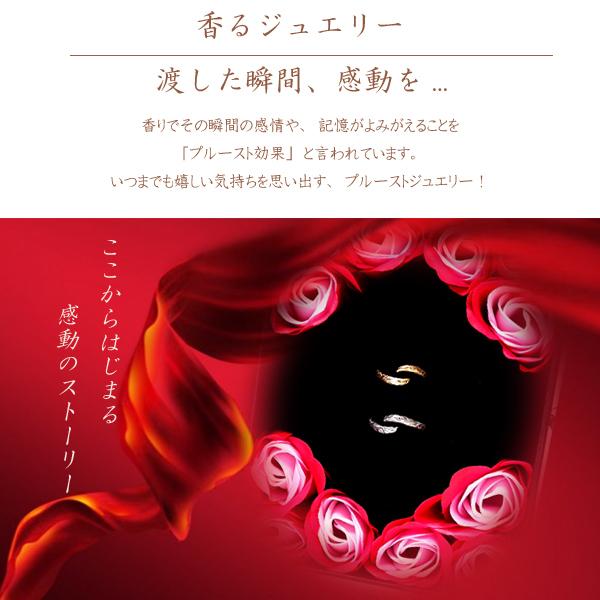 ペアリング ペアハワイアンジュエリー リング 指輪 スクロール 波 サージカルステンレス ステンレス 花 入浴剤 写真フレーム フラワーの画像
