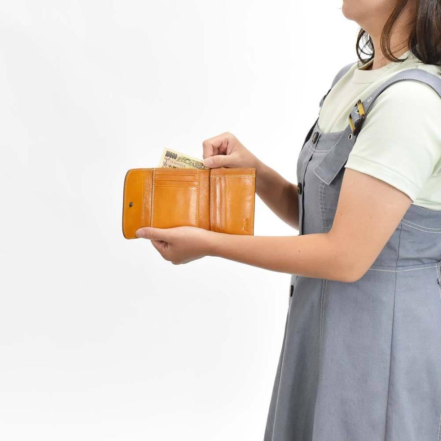 美品 Dakota ダコタ 二つ折り財布 トリコローレ がま口 楽天市場】二つ折り財布 がま口小銭入れ ダコタ Dakota トリコローレ