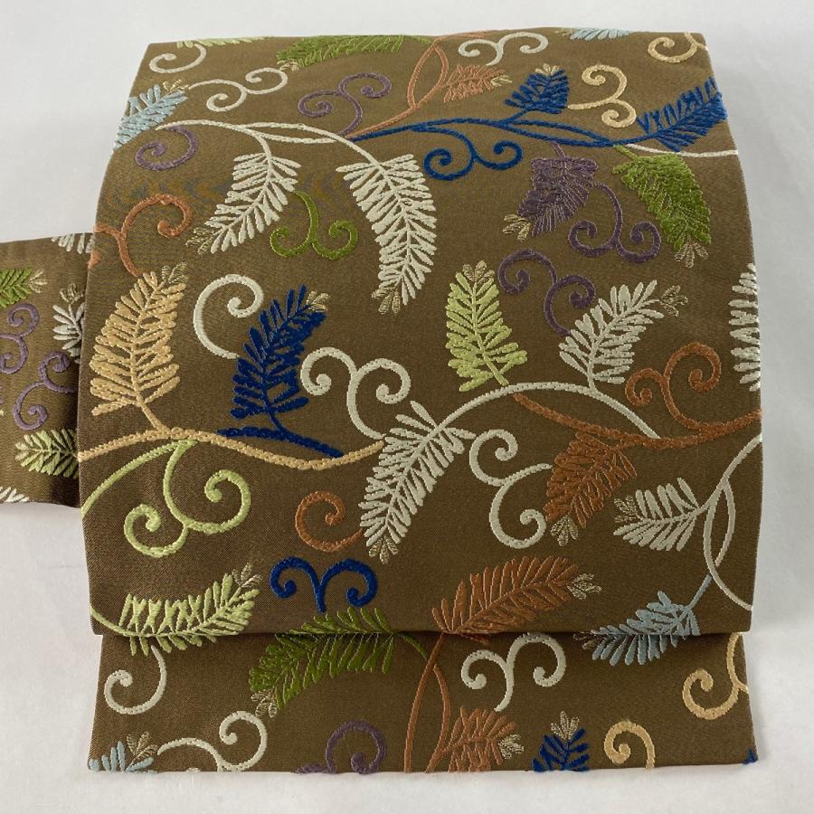 名古屋帯 逸品 川島織物 落款あり 若松 唐草 唐織 金糸 茶色 正絹 中古  