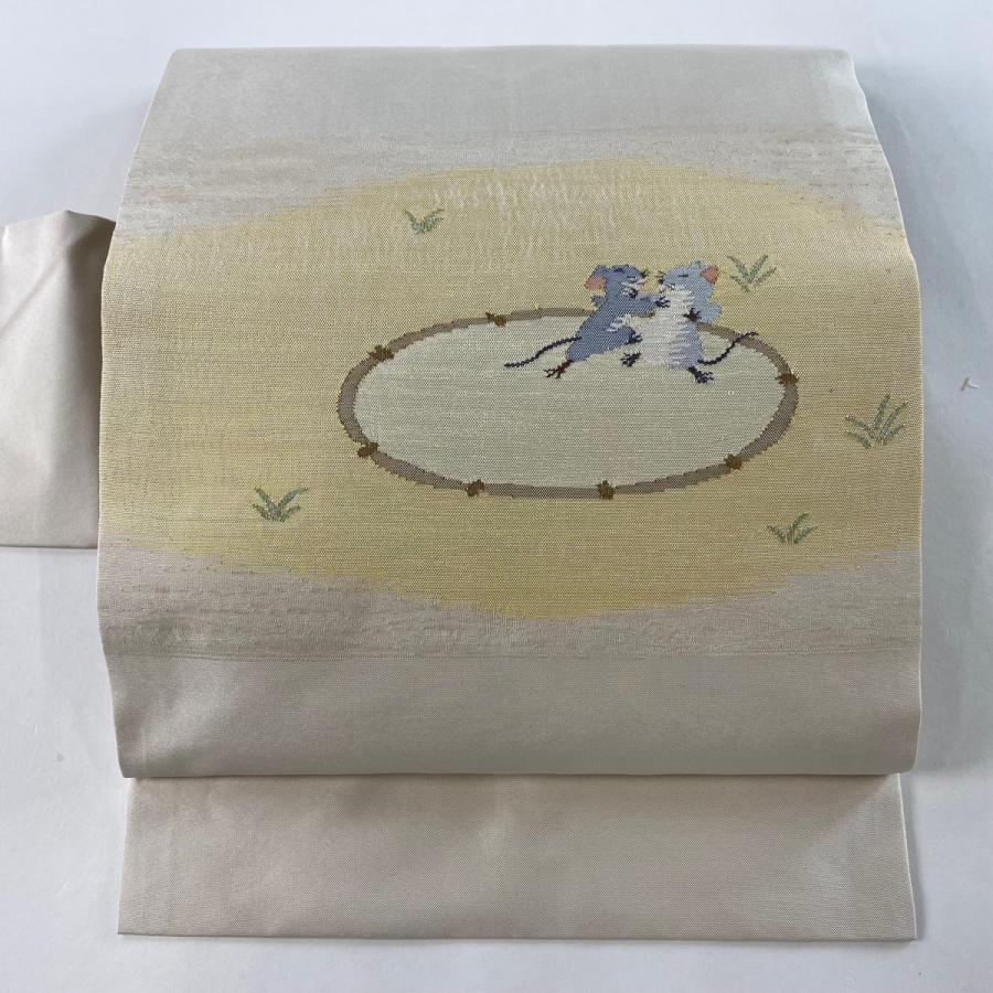 名古屋帯 美品 逸品 ねずみの相撲 軍配 クリーム 正絹 中古 : リユース
