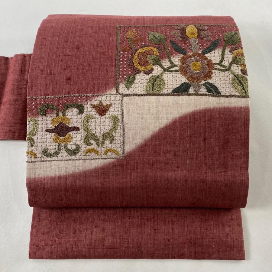 名古屋帯 美品 秀品 建物 松梅 刺繍 紬地 待ち遠しい 朱色 正絹 中古