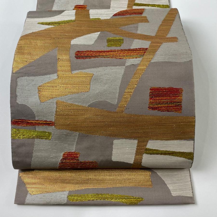 袋帯 逸品 洛風林 落款あり 幾何学模様 箔 ラメ箔 灰茶 六通 正絹 中古  