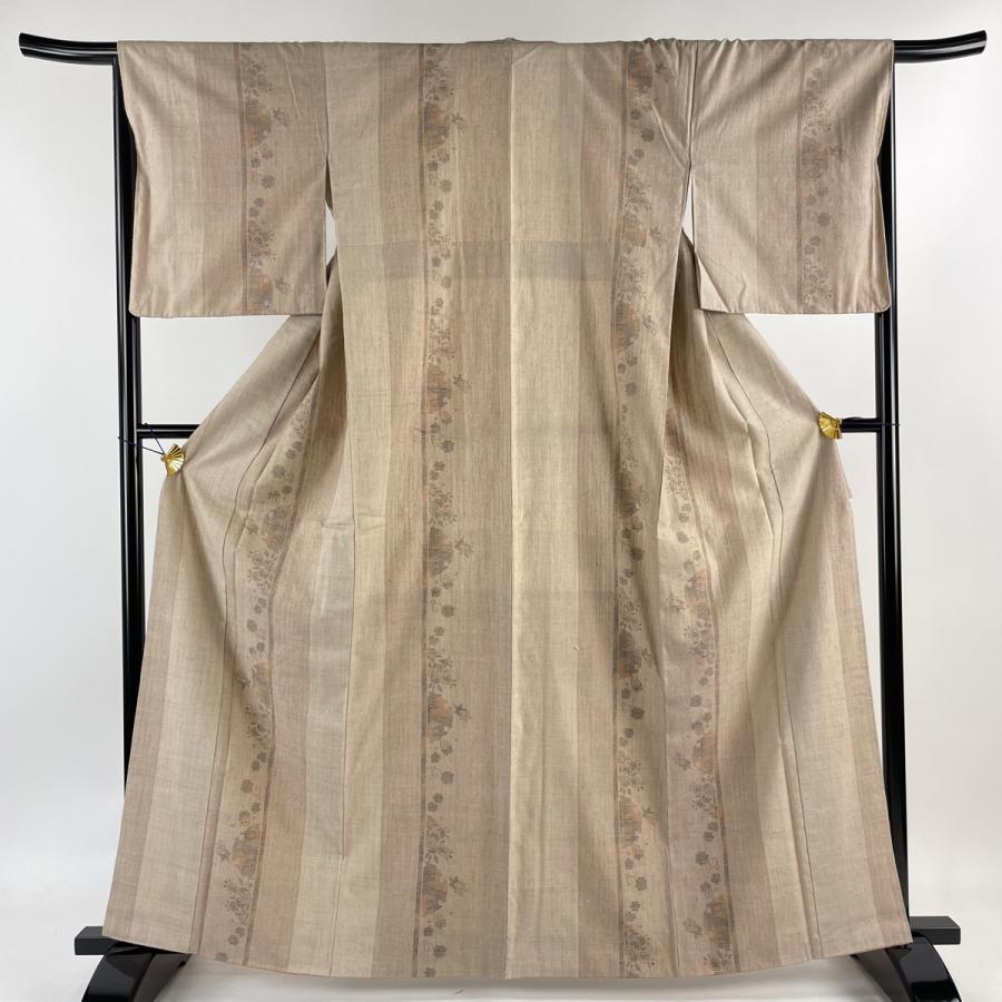 結城紬 身丈163cm 裄丈66.5cm M 袷 本場結城紬 証紙あり 雪輪 亀甲絣  