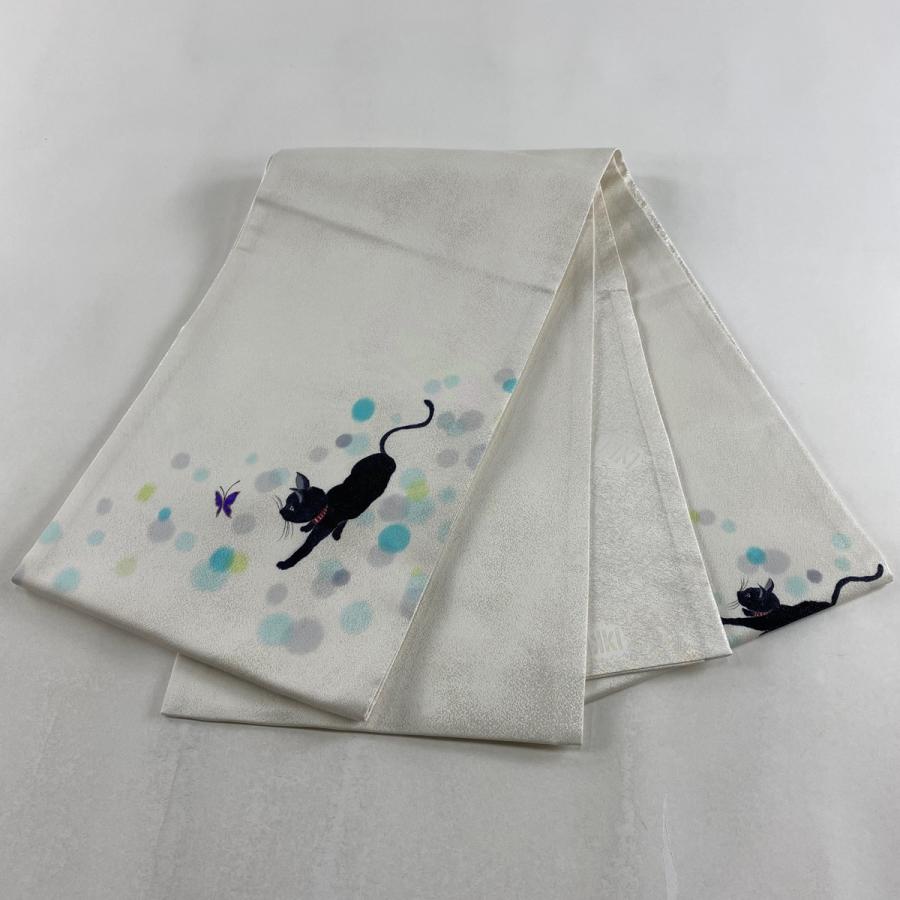 袋帯 美品 逸品 落款あり ikki流 黒猫 蝶 銀通し 金彩 白 お太鼓 袋帯 美品 逸品 落款あり ikki流 黒猫 蝶 銀通し 金彩 白 お太鼓