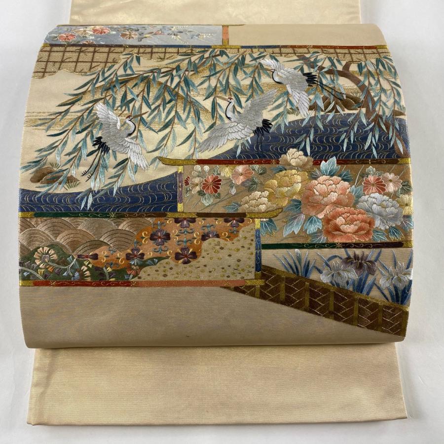 袋帯 逸品 蒋雪英 落款あり 鶴 草花 刺繍 金糸 金色 お太鼓柄 袋帯 逸品 蒋雪英 落款あり 鶴 草花 刺繍 金糸 金色 お太鼓柄