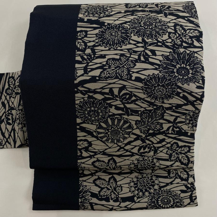 名古屋帯 美品 秀品 落款あり 伊勢型染 草花 雪芝 縮緬 黒 正絹 中古 