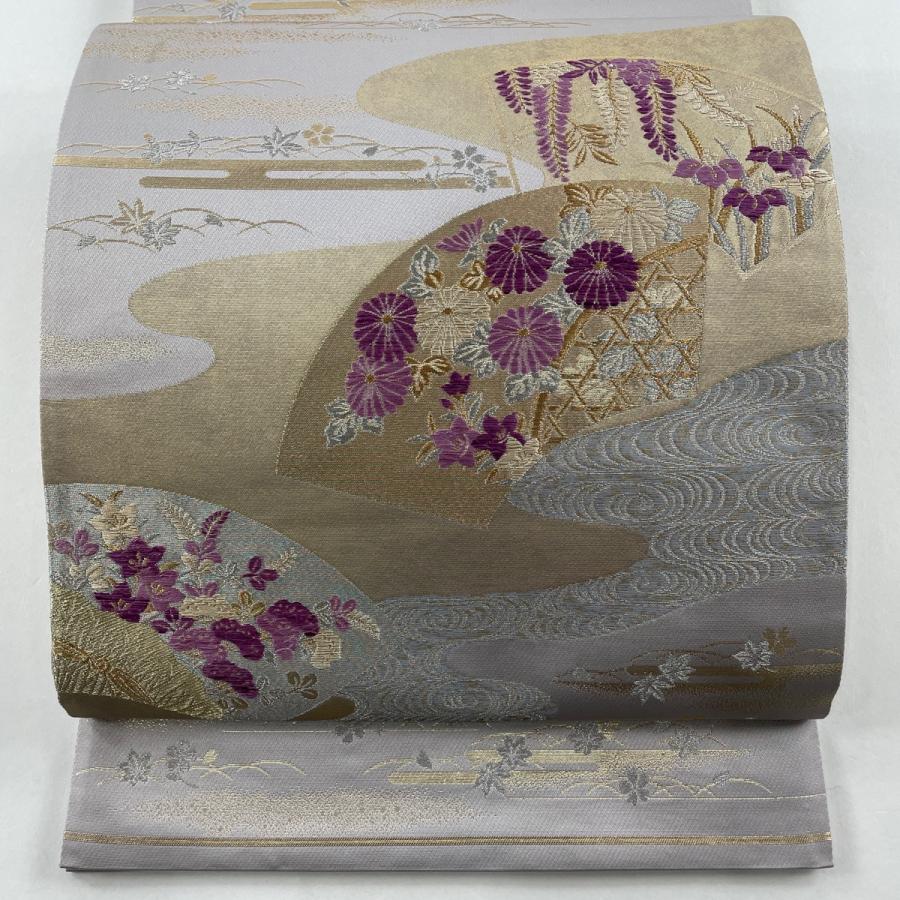 袋帯 落款あり キラキラ 草花 桐 銀通し 薄紫 お太鼓柄 正絹