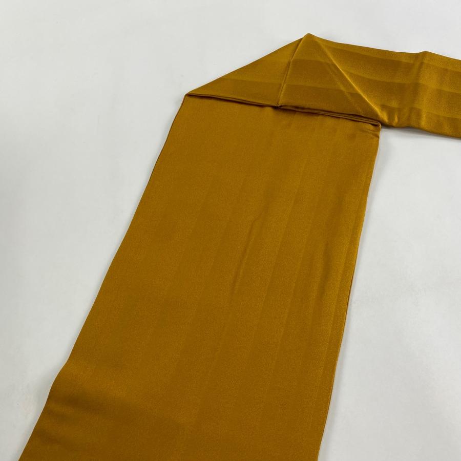 名古屋帯 逸品 落款あり 昔ばなし 金彩 山吹茶色 正絹 中古