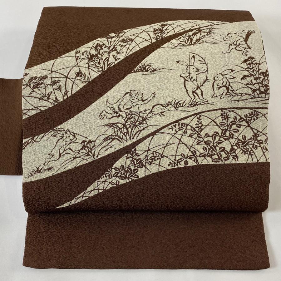 名古屋帯 逸品 落款あり 伊勢型染 鳥獣戯画 縮緬 茶色 正絹 中古