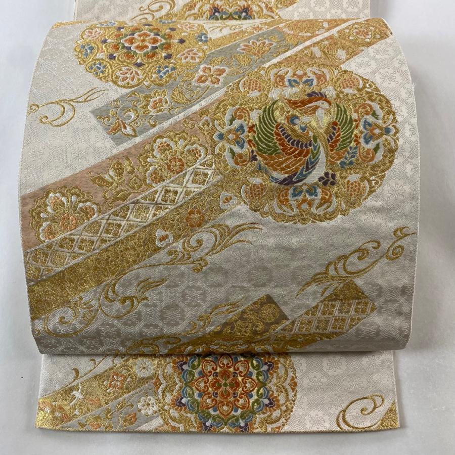 袋帯 秀品 服部織物 落款あり 鳳凰 華文 箔 唐織 クリーム 六通