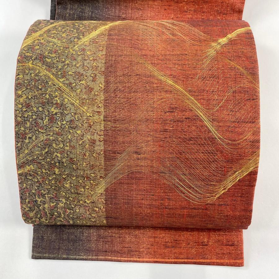 美品 袋帯 名品 関西仕立て 幾何学模様 金糸 茜色 お太鼓柄 正絹 中古