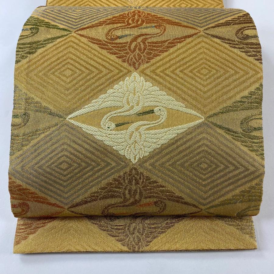 美品 袋帯 逸品 誉田屋源兵衛 落款あり 天蚕 鈴乃屋 菱 鶴 金銀糸 金色