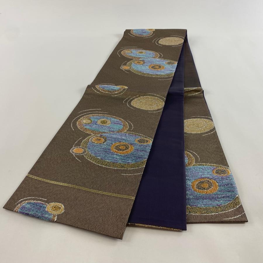 美品 袋帯 名品 証紙あり 幾何学 金糸 箔 金茶 六通 正絹 中古