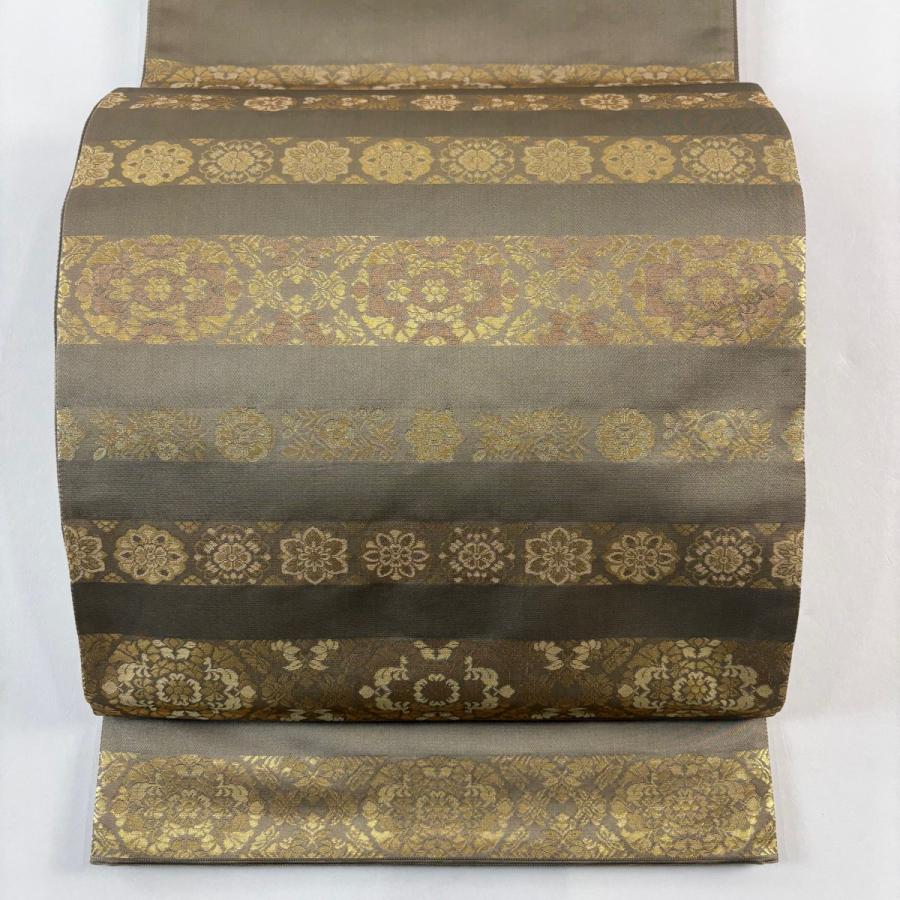 美品 袋帯 秀品 華文 段縞 箔 灰茶 お太鼓柄 正絹 中古 : リユース
