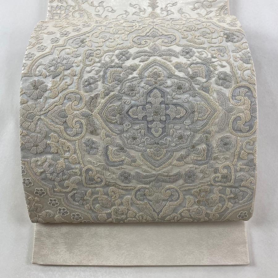 袋帯 美品 逸品 華文 明綴れ 金糸 灰白 お太鼓柄 正絹 袋帯 美品 名品 華文 鳥 螺鈿 金糸 銀色 お太鼓柄 正絹 中古