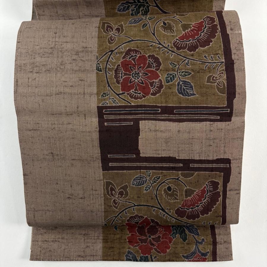 美品 袋帯 秀品 落款あり 草花 紬地 茶紫 お太鼓柄 正絹 中古