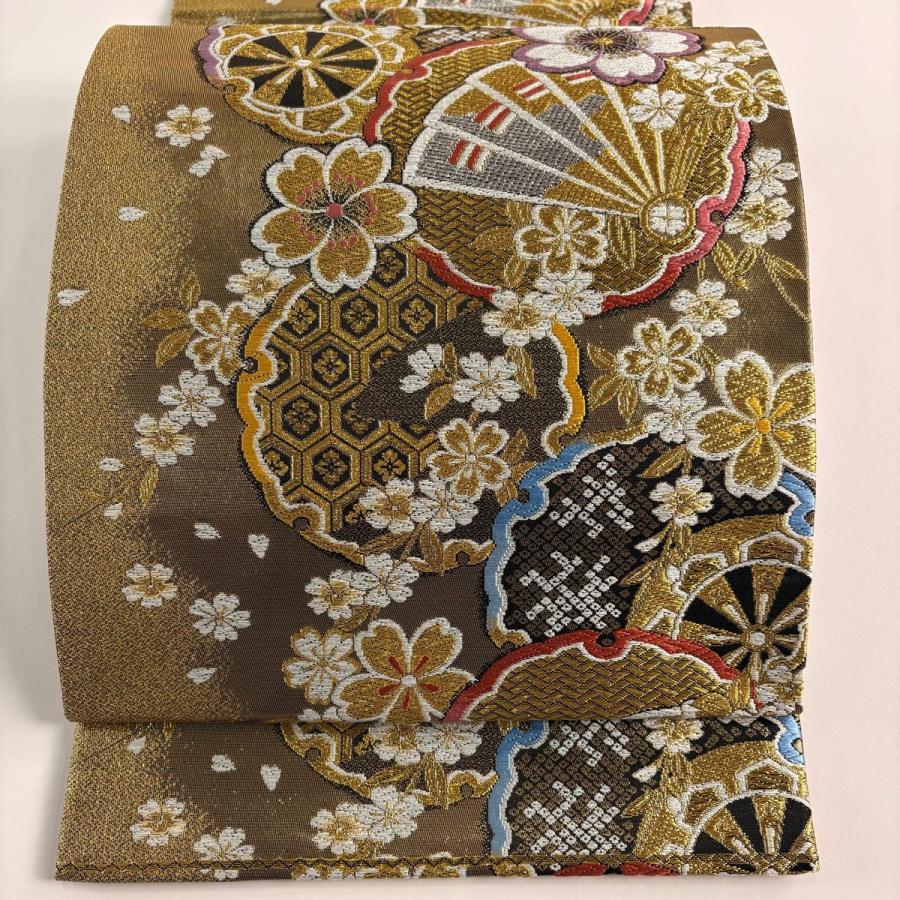 美品 袋帯 秀品 振袖向き 雪輪 桜 箔 金銀糸 金色 六通 正絹 中古