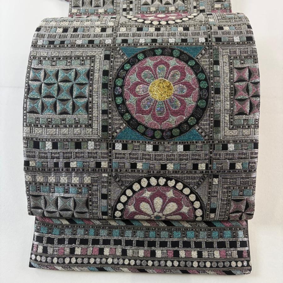 美品 袋帯 逸品 誉田屋源兵衛 落款あり 華文 幾何学 銀糸 箔 黒 お太鼓