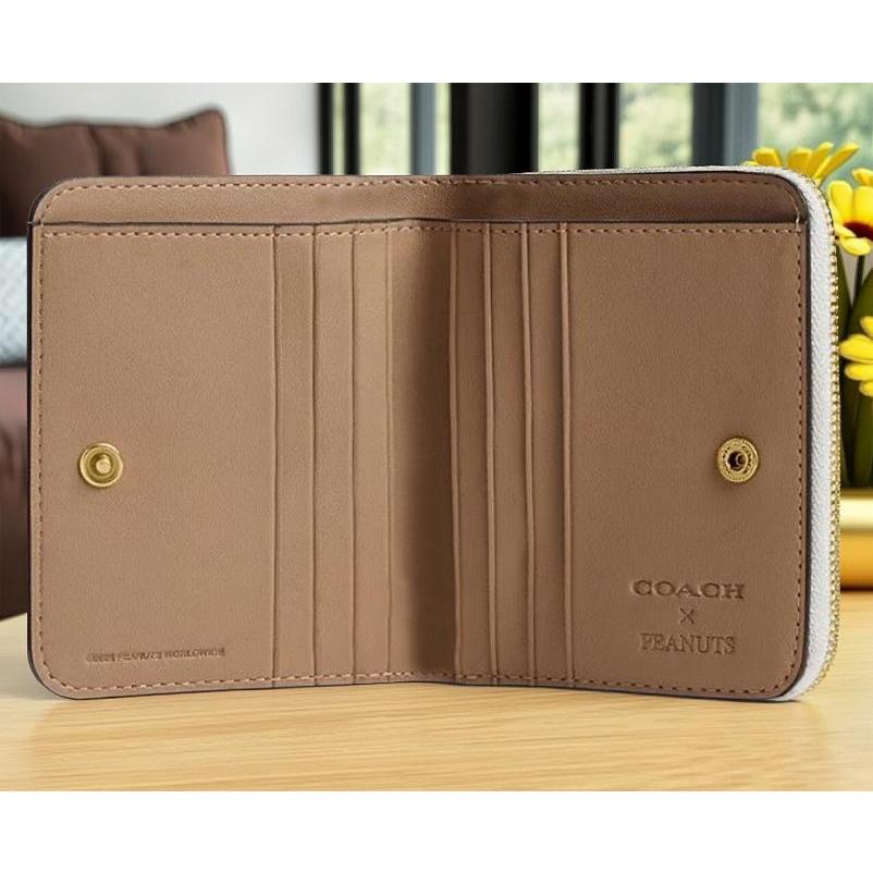 COACH コーチ X ピーナッツ コラボ スヌーピープリント 二つ折り