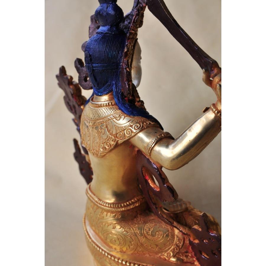 ネパールパタン製　仏像　マンジュシャリ　文殊菩薩　　ヒマラヤ水晶　手彫りカービング　銅製金箔水晶【送料無料】