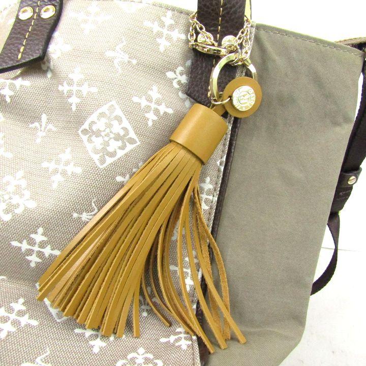 russet　ダブルフェイスミニショルダーバッグ　2WAY タッセルチャーム russet ダブルフェイスミニショルダーバッグ 2WAY タッセル